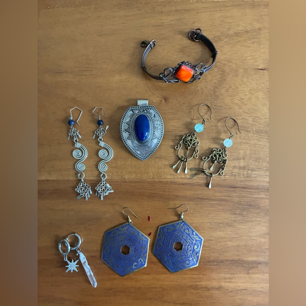 Earrings, bracelet and medallion